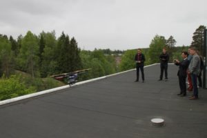 Scientists flying a drone