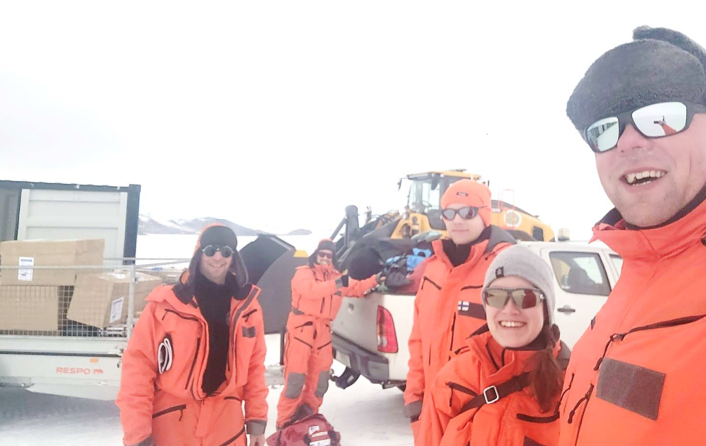 Researchers at Antarctica loading cargo for the research station